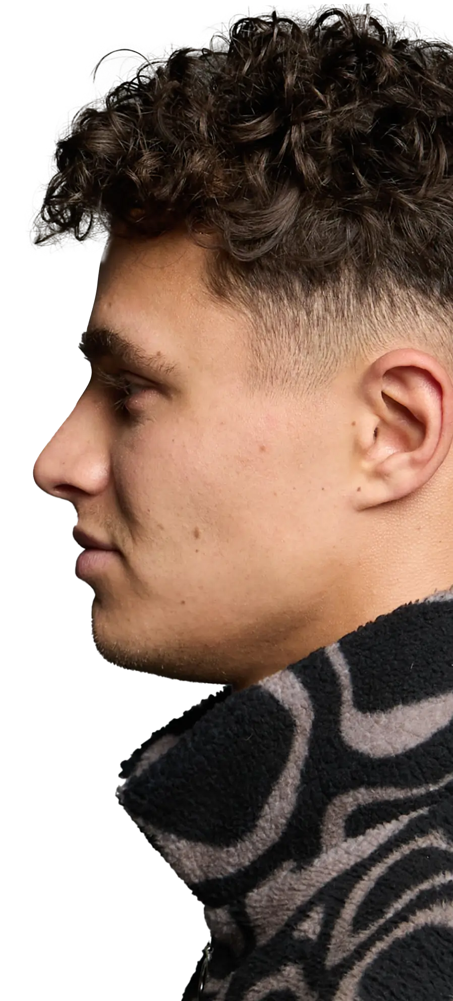 Lando Norris wearing a fleece side profile